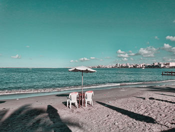 Scenic view of beach against sky