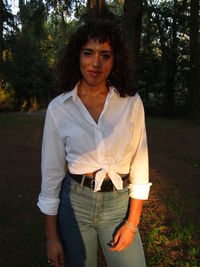 Portrait of mature man standing on field