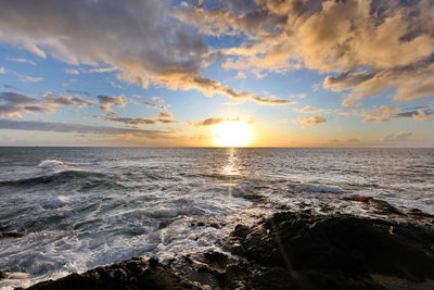 Scenic view of sea against sky during sunset