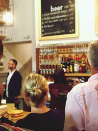 Rear view of people at restaurant