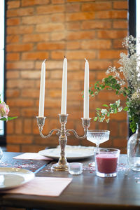 Close-up of glasses on table in restaurant