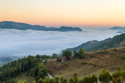 Scenic view of mountains against sky during sunset