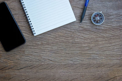 High angle view of mobile phone on table