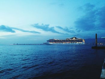 Scenic view of sea against cloudy sky