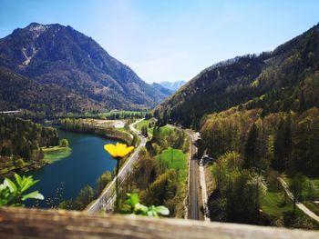 Scenic view of lake and mountains against sky