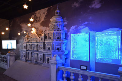 Illuminated buildings in city at night