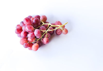 Close-up of fruits against white background