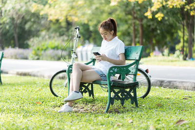 Woman sitting in park