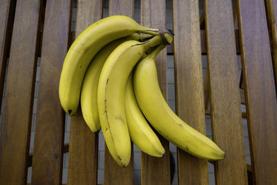 Close-up of bananas on wooden wall