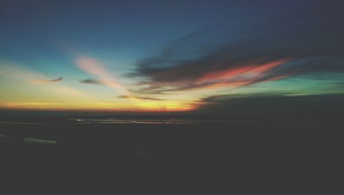 Scenic view of sea against sky at sunset