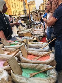 People at market stall