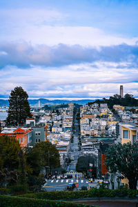 Buildings in city against sky