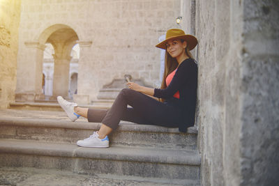 Tourist woman walking on vacation in street, arequipa, peru. selective focus