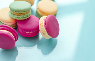 Close-up of macaroons against white background