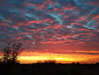 Scenic view of dramatic sky during sunset