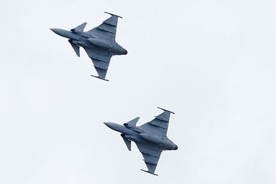 Low angle view of airplane against sky