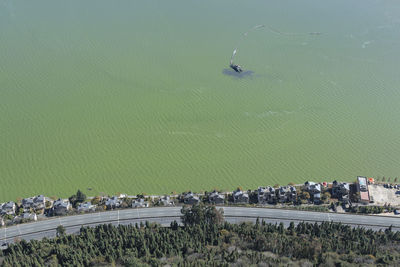 Aerial view of houses by polluted dian lake