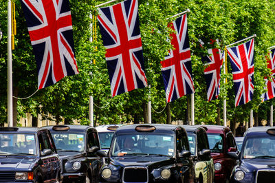 British flags hanging over city street