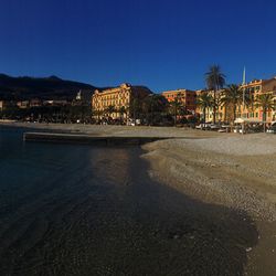 Scenic view of bridge over city against sky at night