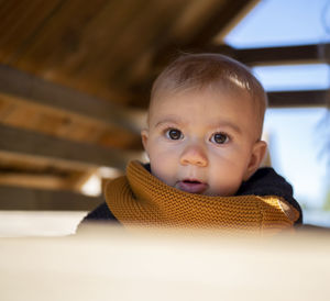 Portrait of cute baby girl at home