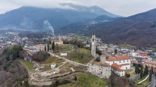 High angle view of townscape and mountains