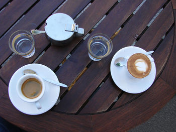 High angle view of coffee cup on table