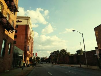 Street in city against sky