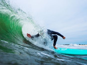 Man surfing on sea