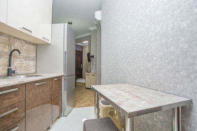 Empty tables and chairs at home