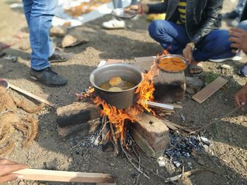 Low section of people on cutting board