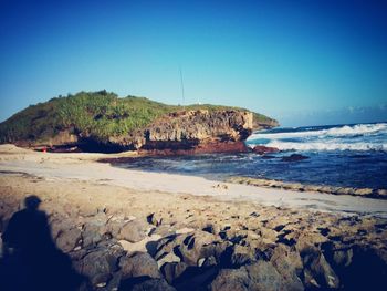 Scenic view of sea against clear sky