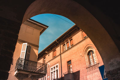 Low angle view of old building against sky