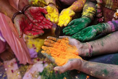 Close-up of human hands with powder paint