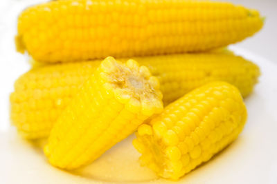 Close-up of yellow slices on table