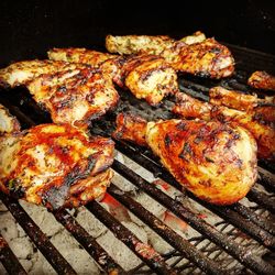 Close-up of meat on barbecue grill