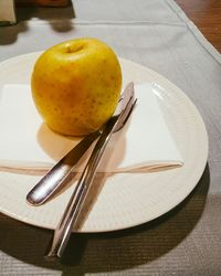Close-up of fruits in plate on table