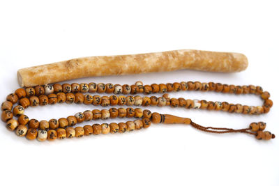 Close-up of bread on white background