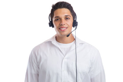 Portrait of smiling man against clear sky