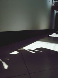 High angle view of sunlight falling on floor in building