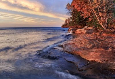 Scenic view of sea against sky during sunset