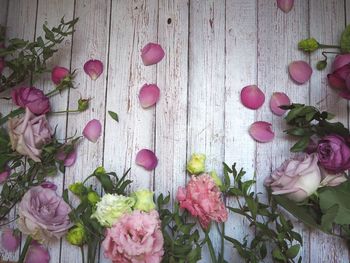 High angle view of pink roses on table