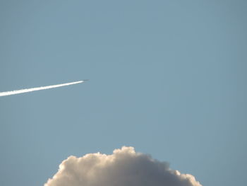 Low angle view of vapor trail in sky