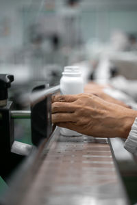 Close-up of man working at table