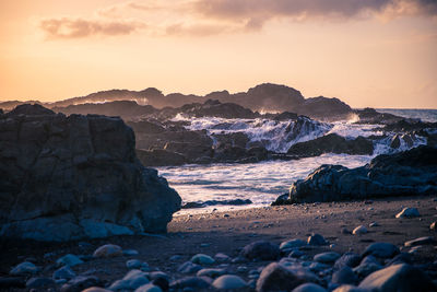 Scenic view of sea against sky during sunset