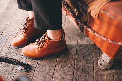 High angle view of man in brown shoe