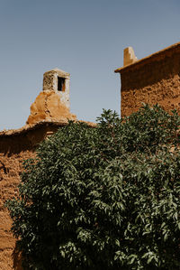 Low angle view of old building against sky