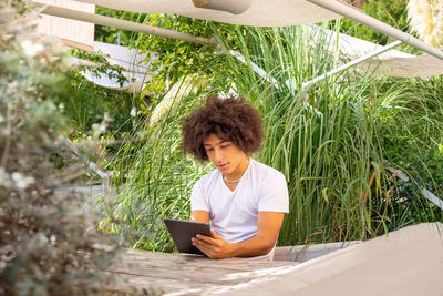 Young woman using mobile phone