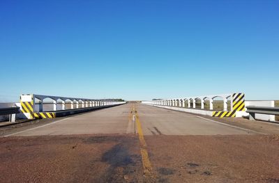 View of bridge against clear blue sky