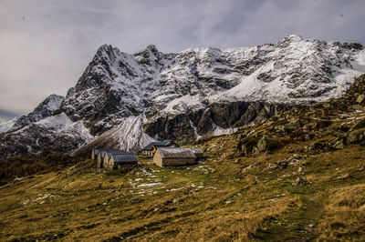 Scenic view of snowcapped mountains against sky