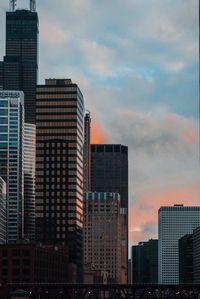 View of skyscrapers at sunset